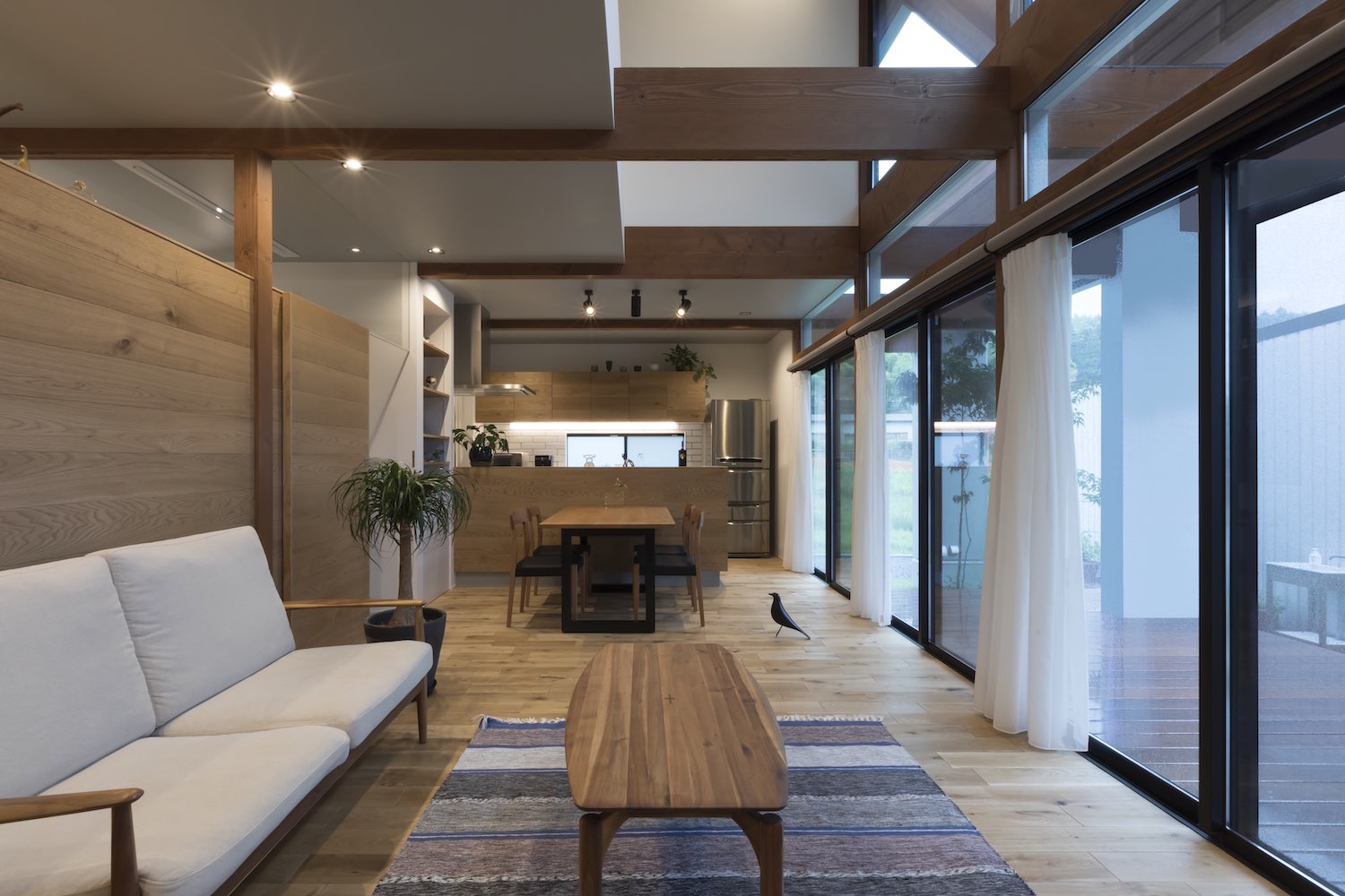 cozy living area with sofa and wooden table 