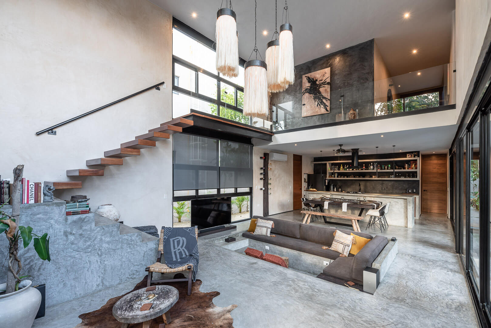 floating staircase and sunken living room 