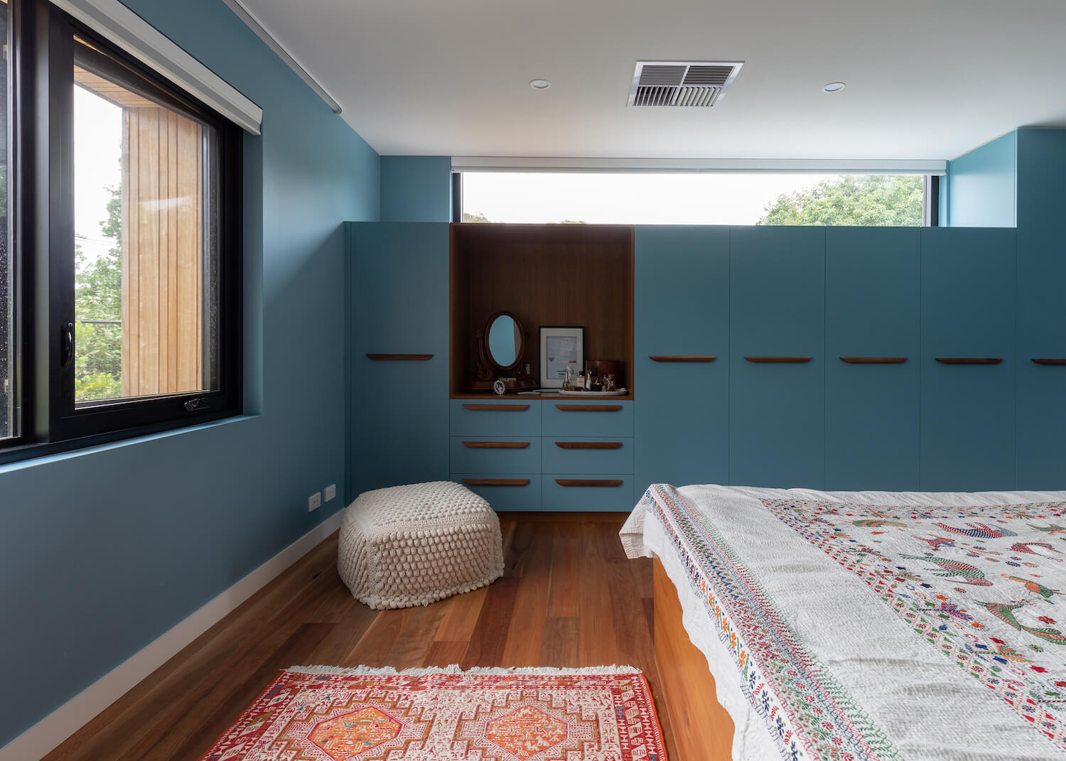 master bedroom with blue walls 