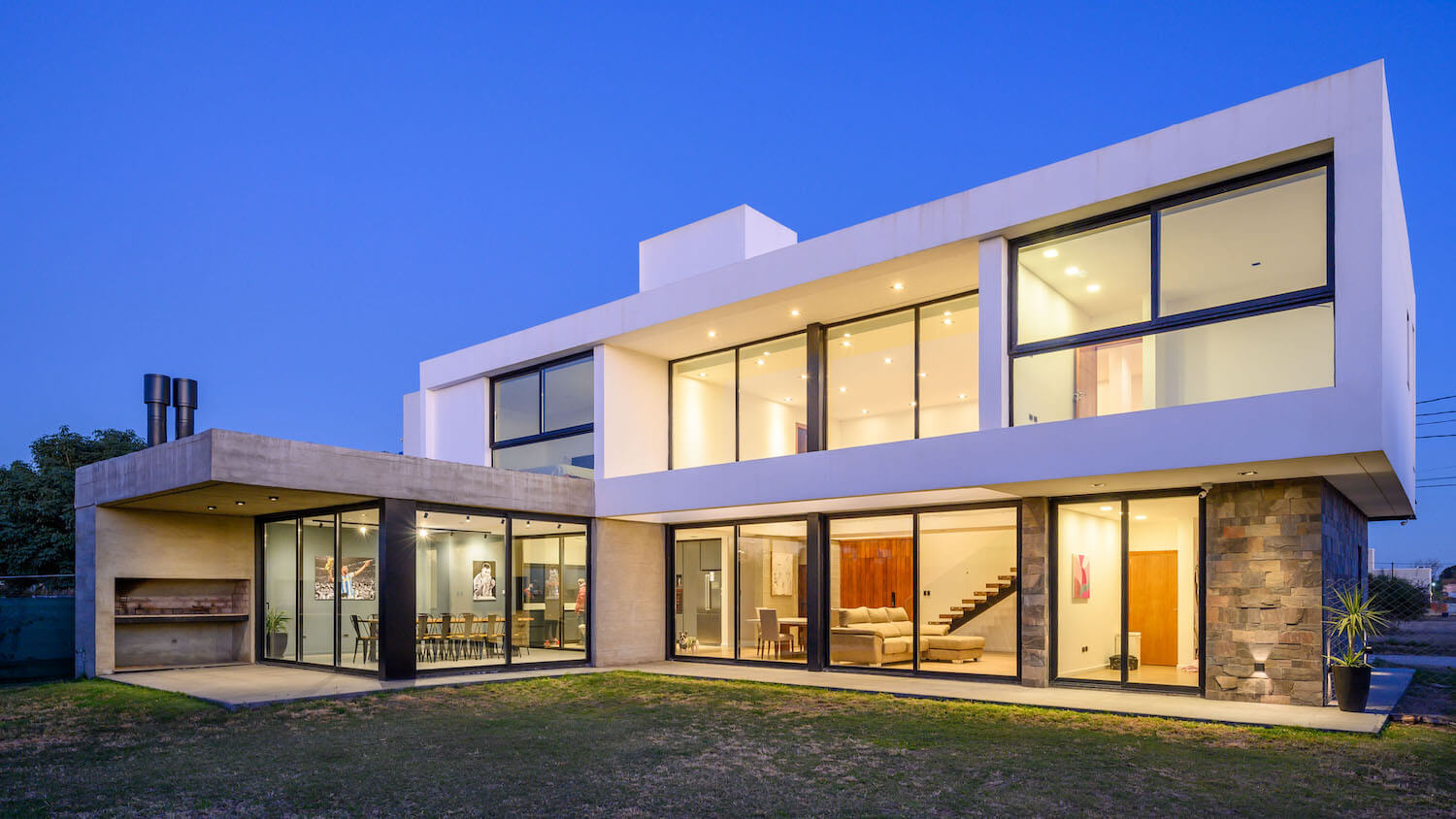 MZ Arquitectos design Casa CT in Barrio|Houses